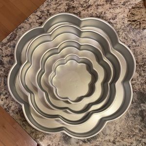 Four Wilton flower cake pans, barely used.